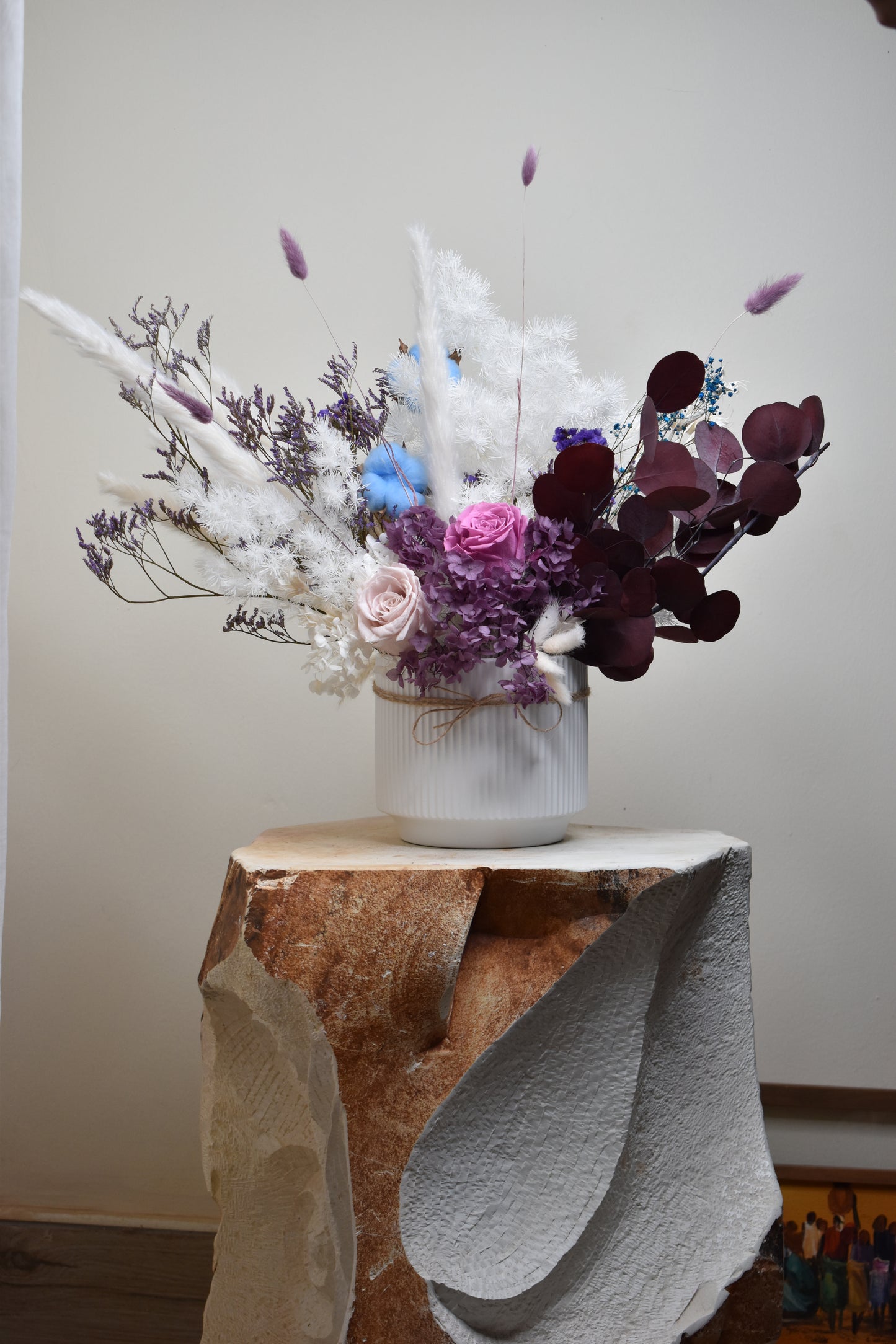 Dried flowers arrangement on a hallway decor piece 16.5 cm diameter and 14.5 cm height white vase.