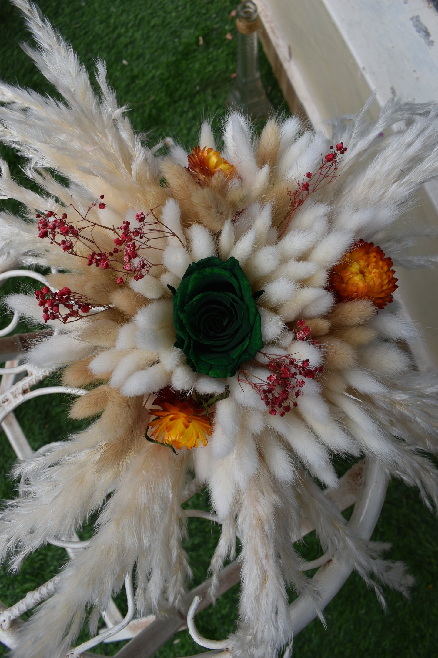 Decorative dried flowers bouquet Kenya with pampas grass, bunny tails, dried baby's breath, everlastings, and green star anise in a vase all from kenyan lady fleur-KLF
