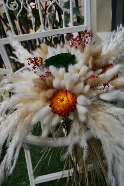 Close-up of decorative dried flowers bouquet Kenya with pampas grass, bunny tails, dried baby's breath, everlastings, and green star anise in a vase all from kenyan lady fleur-KLF