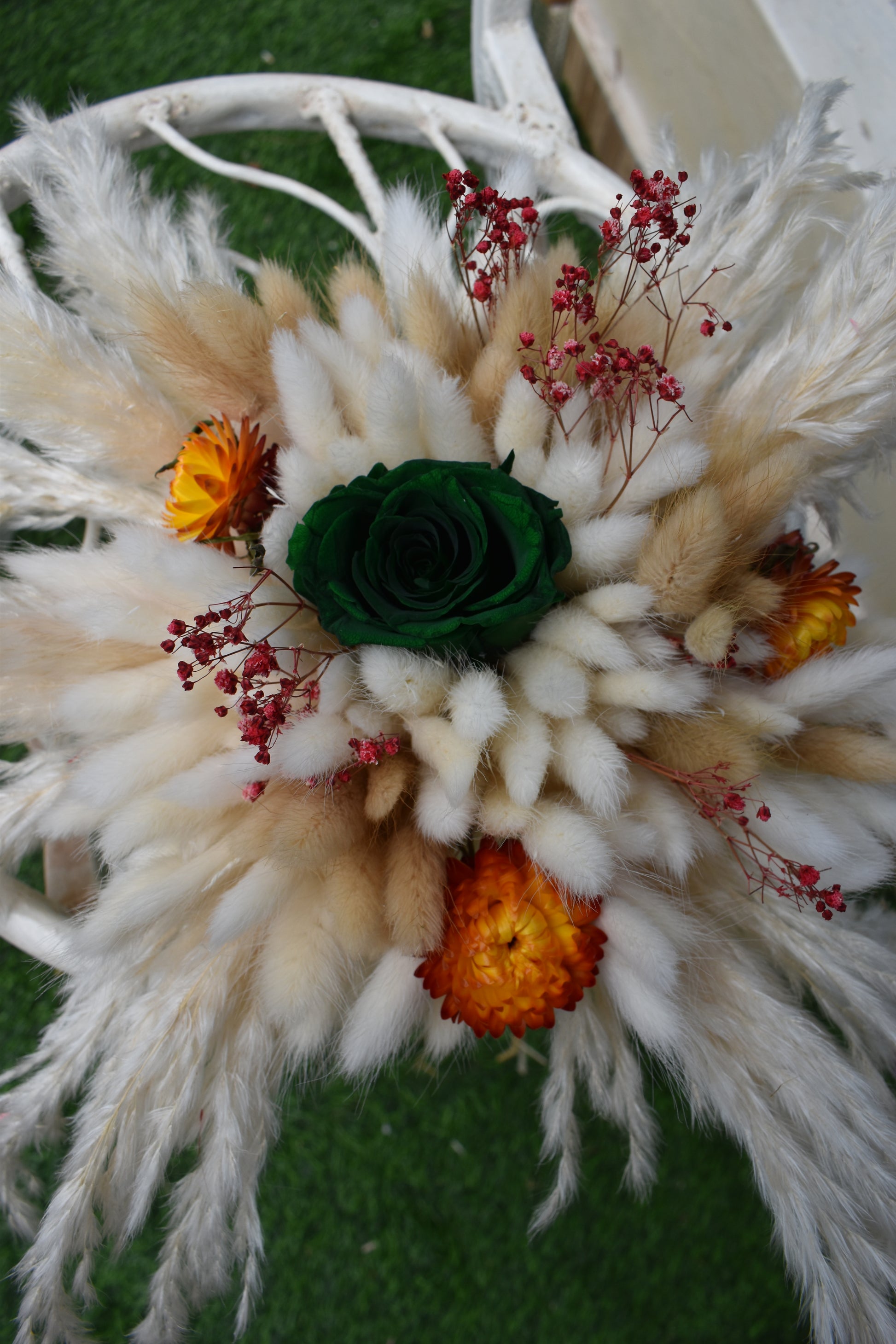 Decorative dried flowers bouquet Kenya with pampas grass, bunny tails, dried baby's breath, everlastings, and green star anise in a vase all from kenyan lady fleur-KLF