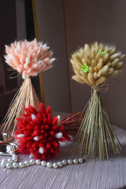 Pink, red, white, and beige Bunny tail grass bouquets from kenyan lady fleur dried flowers shop.