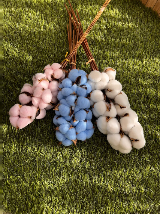 Pink, blue, and white Cotton flower stems from kenyan lady fleur flower shop for minimalist home decor.